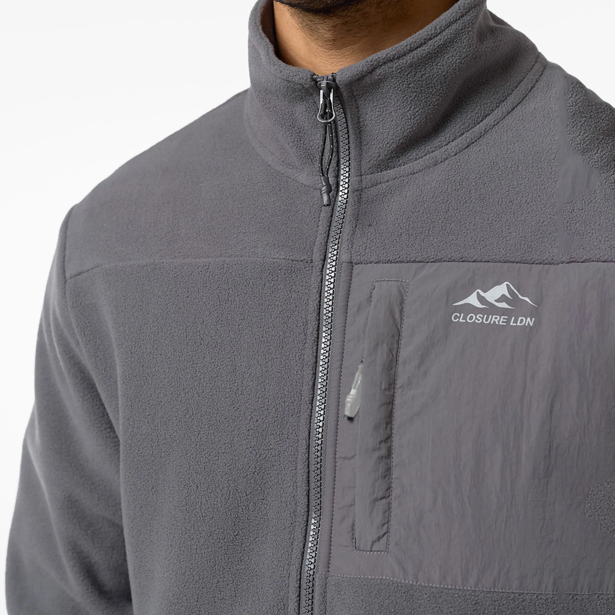 Flexible Fit Wear Flexible Hem Adjustment Polar Fleece Zip Through Jacket | Charcoal