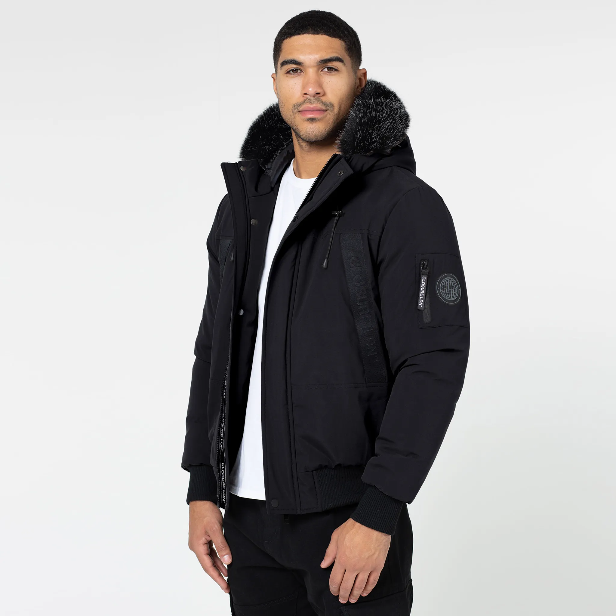 Sleek Layer Fit Taped Zip Pocket Short Puffer Jacket | Black