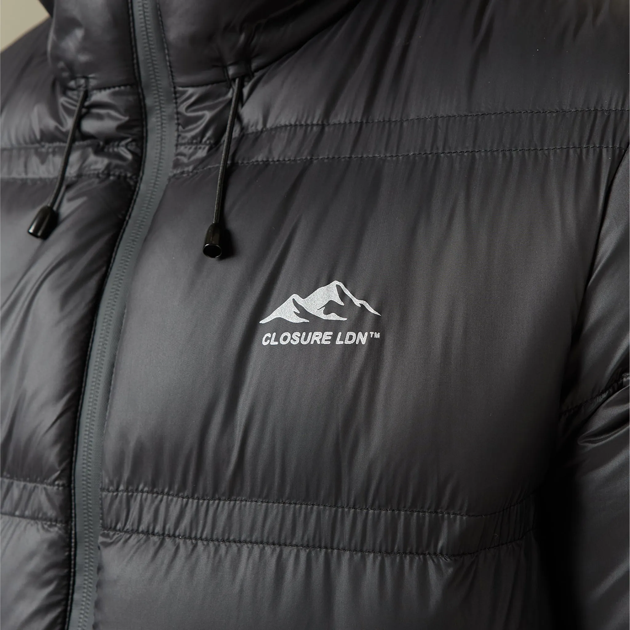 Urban Edge Non Restrictive Fit Logo Racer Puffer Jacket | Black Shine