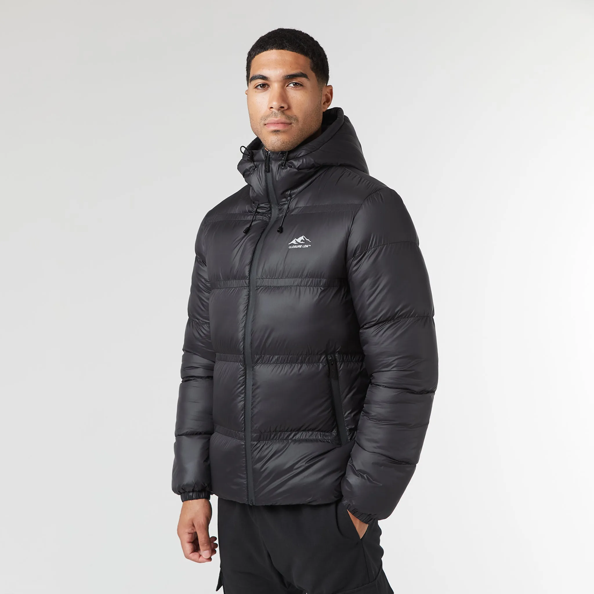 Sun Protection Fabric Logo Racer Puffer Jacket | Black Shine