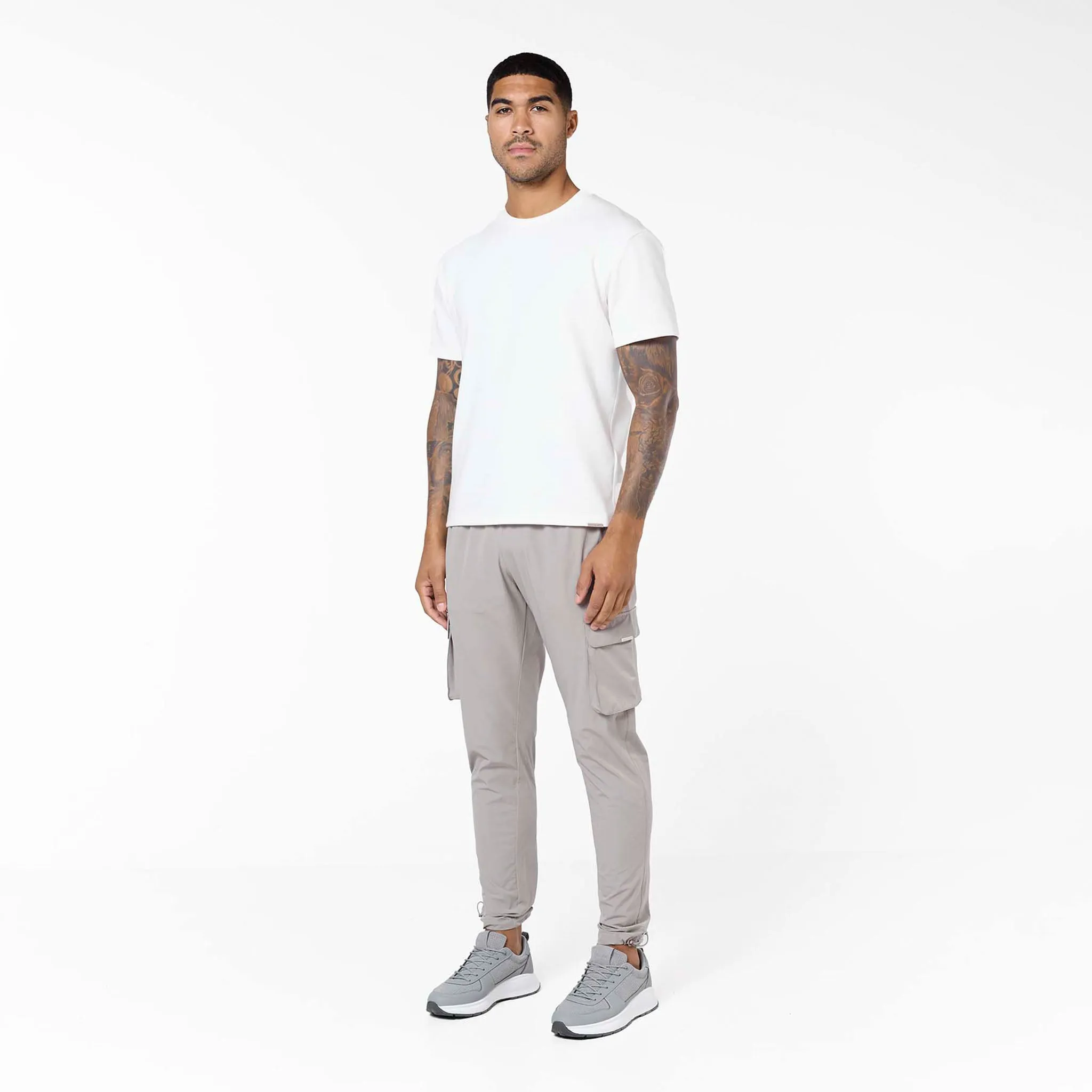 Breathable Lining Non Restrictive Cut Stretch Tech Cargo Pant | Sand