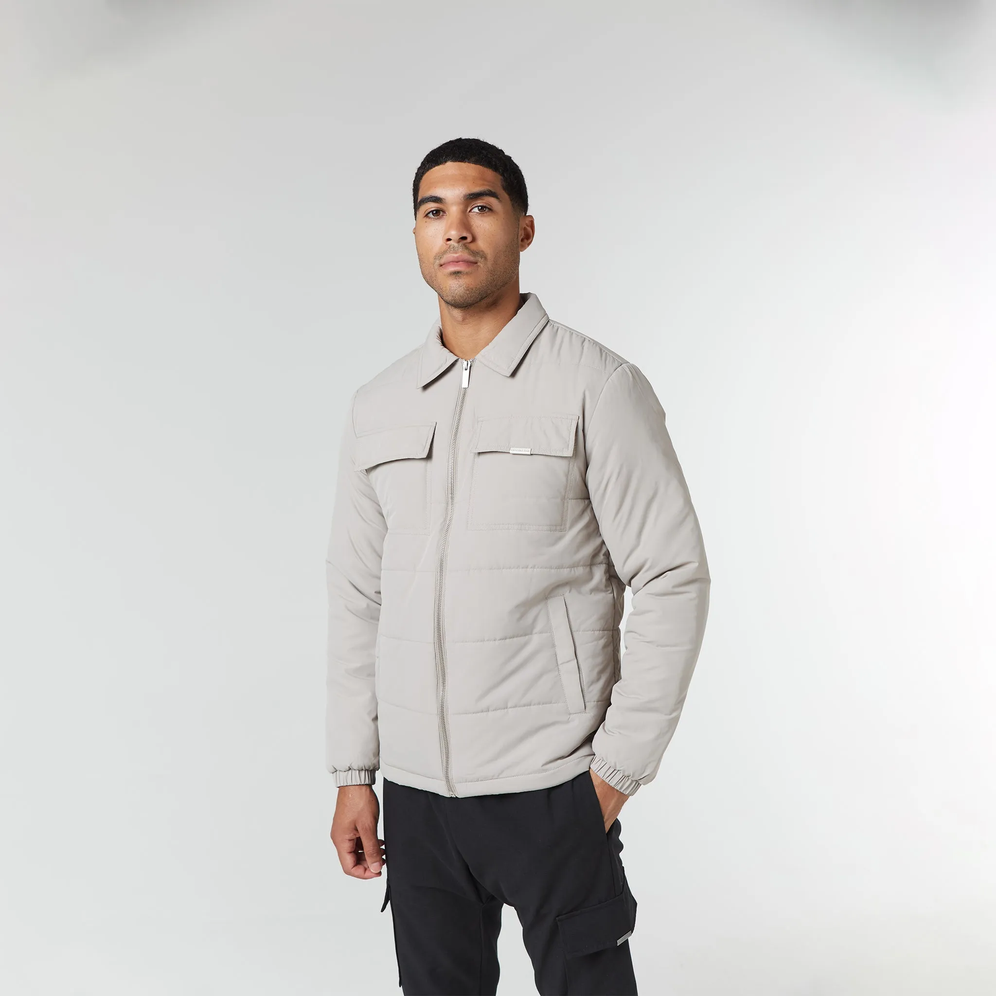 Quilted Overshirt Jacket | Stone Convertible styles Hidden Pocket System