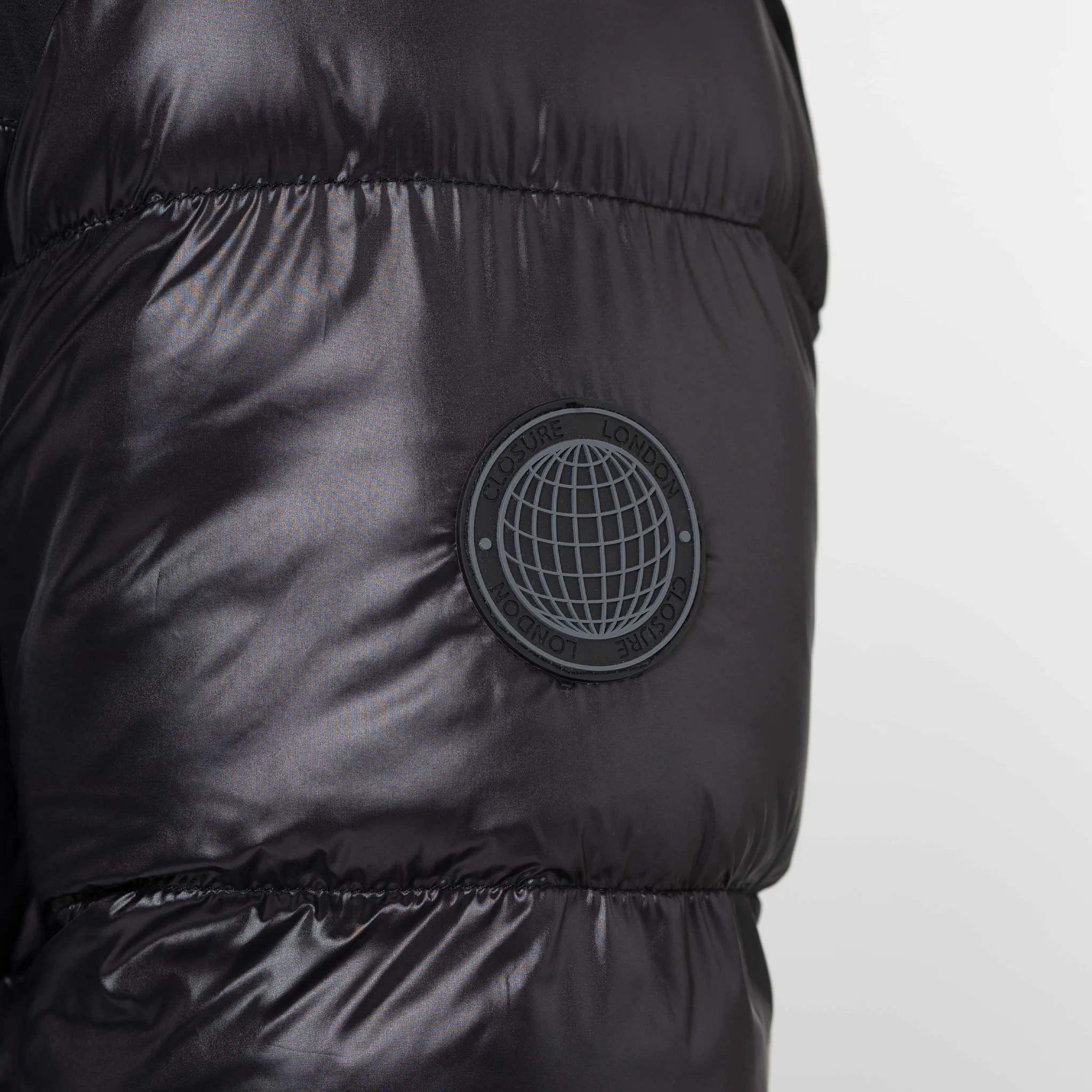 Abrasion Resistant Edges Pocket Puffer Jacket | Black Shine