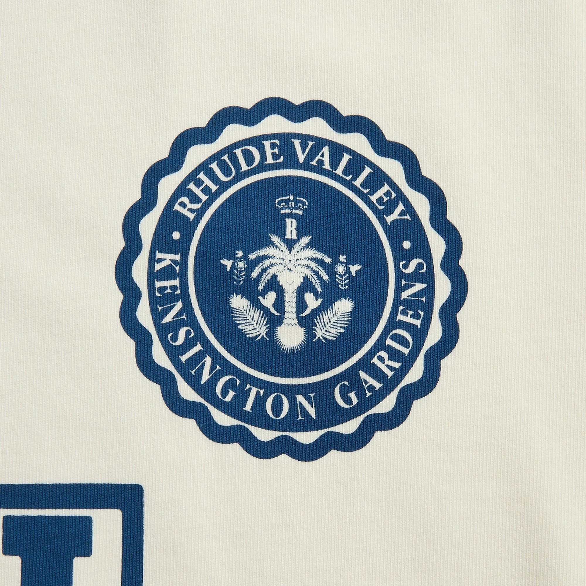 Rhude Collegiate Crest Tee - Vintage White V neck style