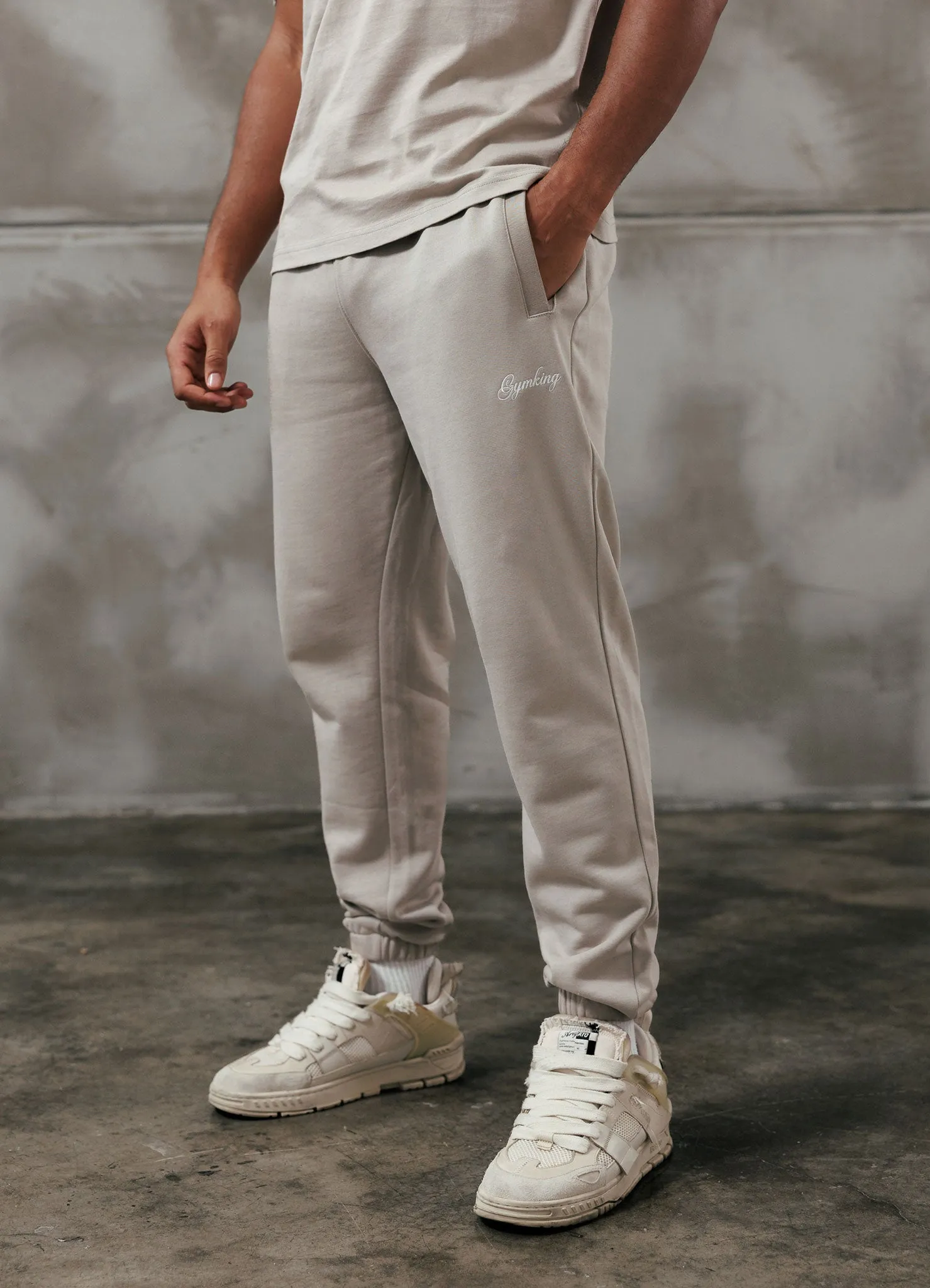 Gym King Script Relaxed Fit Jogger - Light Sand Quick Movement Wear Travel-Ready